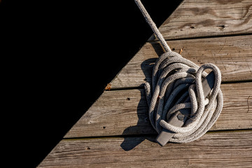 Boat tied off to the dock in a harbor