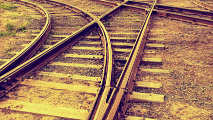 Obraz premium The intersection of railway tracks, toned.