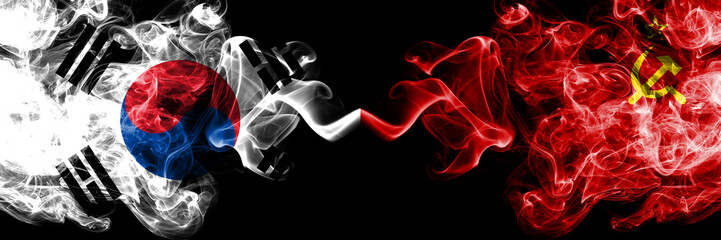 South Korea vs USSR, Communist smoky mystic flags placed side by side. Thick colored silky abstract smoke flags of South Korean and USSR, Communist