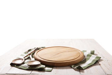 Pizza board, with tablecloth on wooden table and summer background. Top view mockup