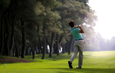 man golfer on a golf course