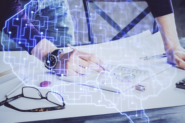 Man with multi exposure brain theme icons.