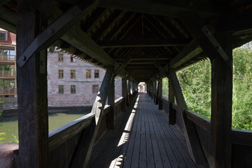 Fototapeta na wymiar Nuremberg, Germany. Medieval wooden bridge.