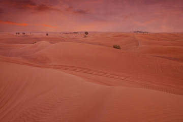 Fototapeta na wymiar Red sand desert dunes sunset view