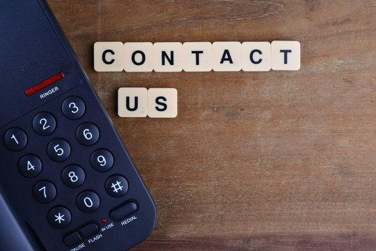 Contact Us Concept. Telephone with word "Contact US"