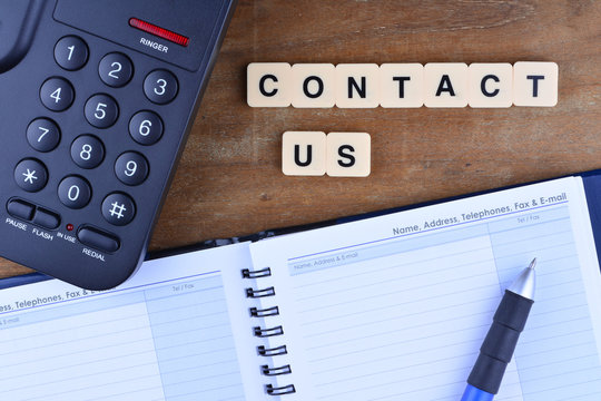 Contact Us Concept. Telephone with word "Contact US"
