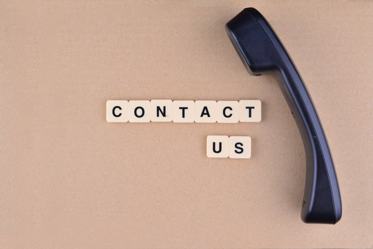 Contact Us Concept. Telephone with word "Contact US"