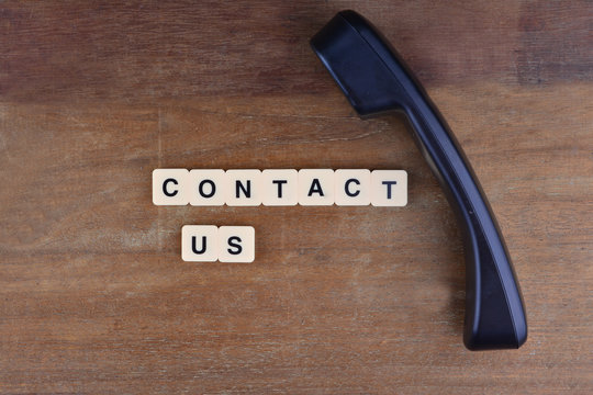 Contact Us Concept. Telephone with word "Contact US"