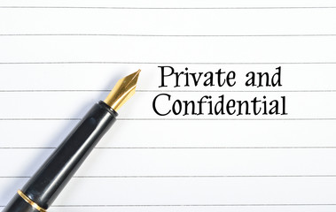 pen writes private and confidental on white blank paper