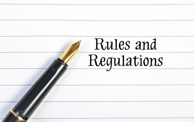 pen writes rules & regulations on paper