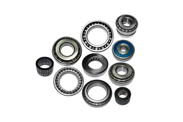 Different types of automotive bearings isolated on white background
