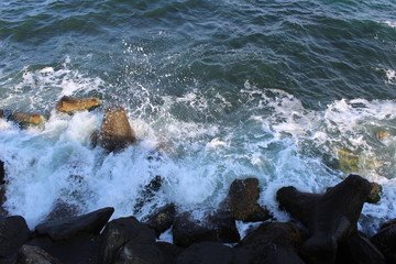 waves crashing on rocks