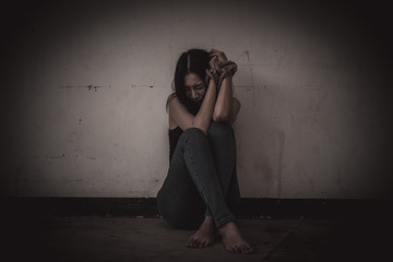 Asian hostage woman Bound with rope at night scene,The thieves kidnapped for ransom,thailand people