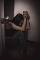 Asian hostage woman Bound with rope at night scene,The thieves kidnapped for ransom,thailand people
