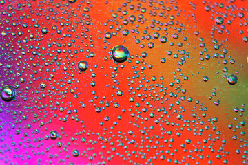 beautiful vials of air in water on a multi-colored background