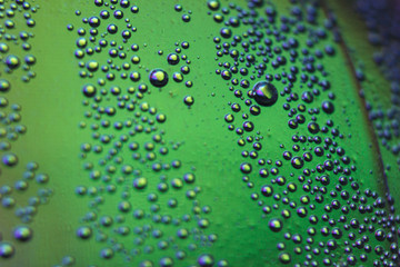 beautiful vials of air in water on a multi-colored background