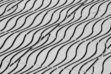 floor tiles in urban city street background - monochrome