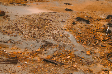 landscape with red soil polluted copper mining factory in Karabash, Russia, Chelyabinsk region, the dirtiest city on Earth