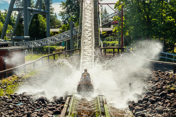 Fun water ride Log river in amusement park at summer