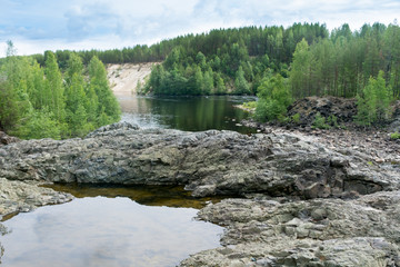 Fototapeta na wymiar Karelia. The volcano Girvas channel Pioneer.