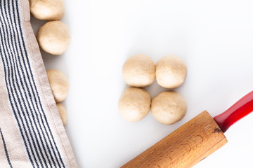 Homemade food concept process braiding bread braid challah dough on white background with copy space