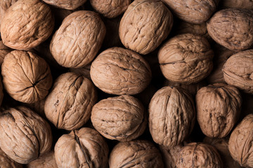 A detailed background of walnuts.