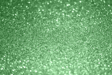 Obraz premium Festive abstract glitter texture background with shiny sparkle colored in Neo mint color. Trendy color of 2020. Suitable for christmas,new year,chinese new year and designs