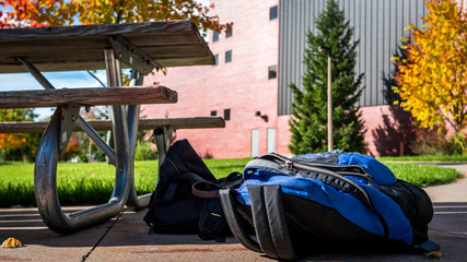 backpack by picnic table