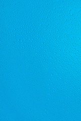 small drops of water on blue background