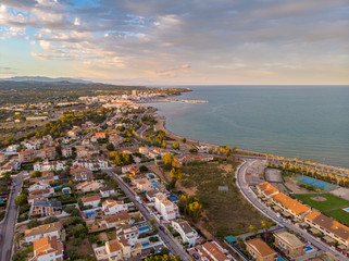 Fototapeta premium The sunset over L'Ampolla, Catalonia, Spain. Drone aerial photo