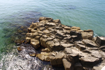 Stack of lava stones on the beach