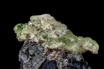 Macro stone Hyalite mineral, tourmaline Sherl, smoky quartz on a black background