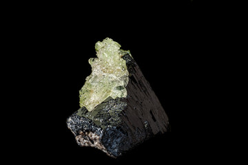 Macro stone Hyalite mineral, tourmaline Sherl, smoky quartz on a black background