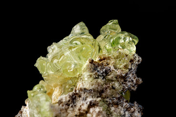 Macro stone Hyalite mineral, tourmaline Sherl, smoky quartz on a black background