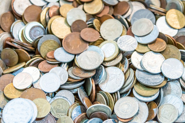Old antique coins on display in antique shop