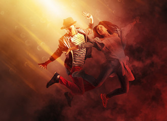 Hip-hop dance party.  Couple hip-hop dancing