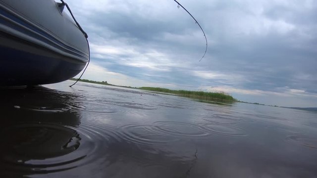 Set of three clips with fisherman fighting, catching and releasing the pike fish (Esox lucius)