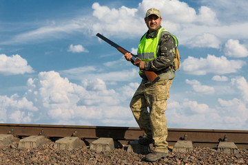 Hunter with a german drathaar and spaniel, pigeon hunting with dogs