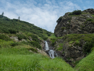 Sarafiovy vodopad waterfall in Beautiful summer mountain landscape near Ziarska chata in Ziarska dolina valley in Western Tatras mountains in Slovakia © Kristyna