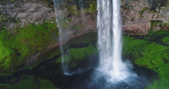 Aerial drone footage of waterfall Seljalandsfoss on Iceland in Icelandic nature. Famous tourist attractions and landmarks destinations in Icelandic nature landscape on the ring road, South Iceland.