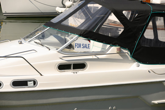 For Sale sign on a cruiser boat