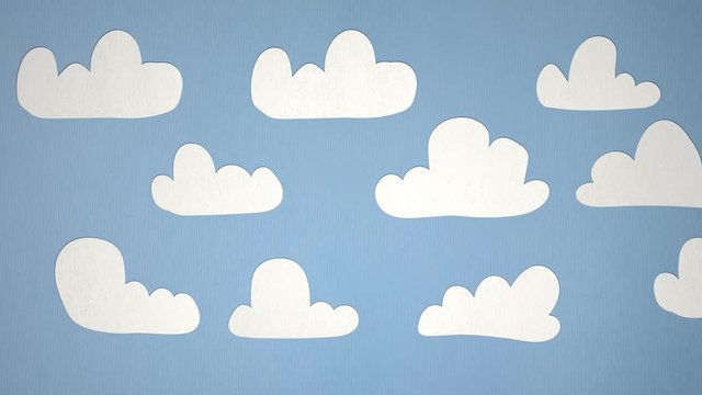 Seamless Stop Motion Clouds Animation On Paper Texture. Ideal For Your Nature/Cloud/Weather Related Projects. High-Quality Animation. 4K,24fps