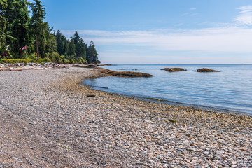 View over Inlet, ocean and island with mountains in beautiful British Columbia. Canada.