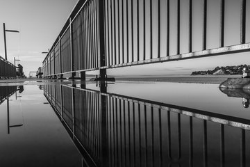pier railings reflection