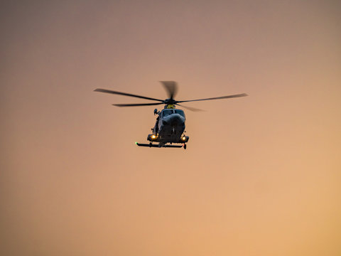  Helicopter in the sunset  over the Caribbean island of Curacao