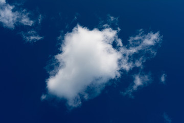 White, Fluffy Clouds In Blue Sky. Abstract Background From Clouds.