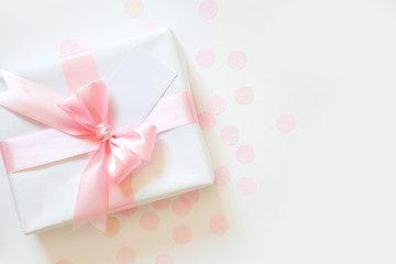 A gift for a girl. Pink satin ribbon with bow.