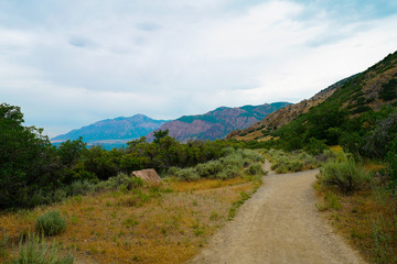 View of trail with Ogden valley background along Waterfall Canyon Trail near Ogden, Utah