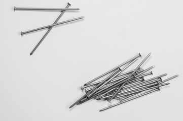 Metal nails isolated on white background. working tools