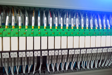 rows of connected switching relays. toning